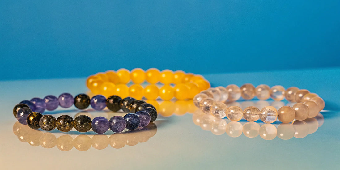 Citrine, amethyst, and clear quartz crystal bracelets for good luck.