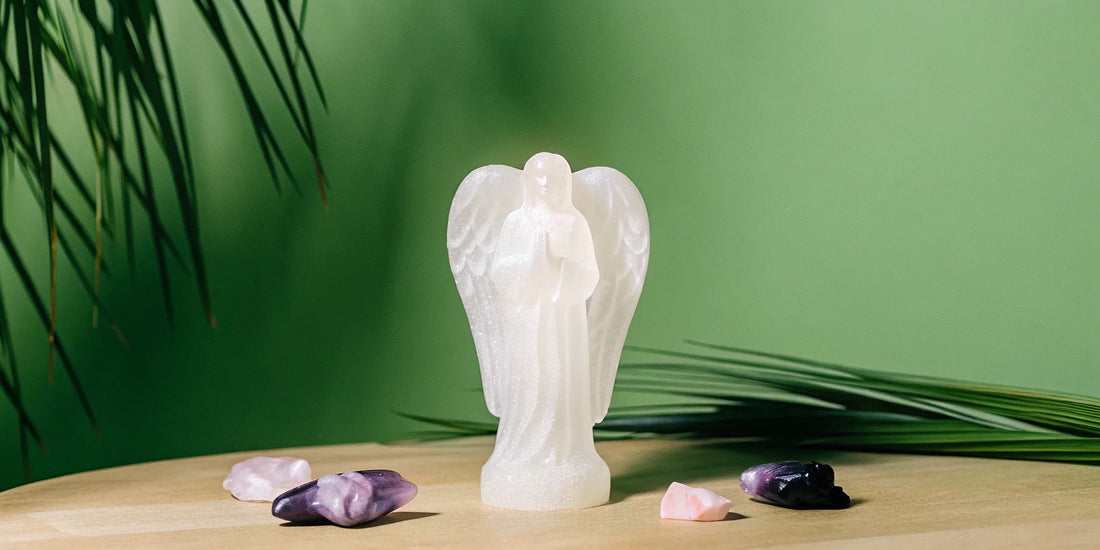 Selenite angel statue for healing and spiritual practices.