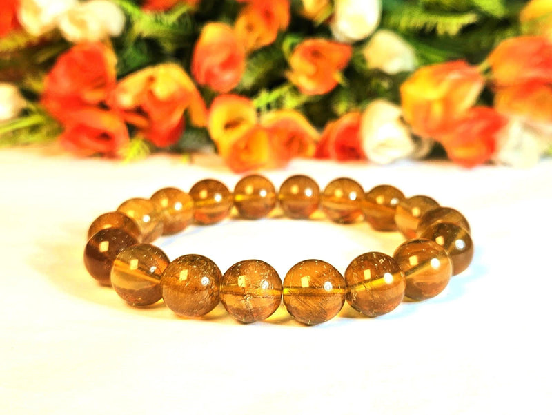 Warm golden citrine beaded bracelet in soft daylight