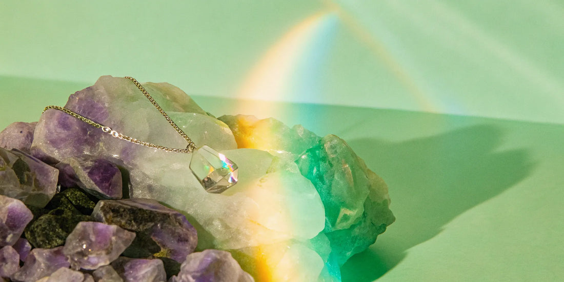 Clear quartz necklace amplifying energy and promoting clarity.