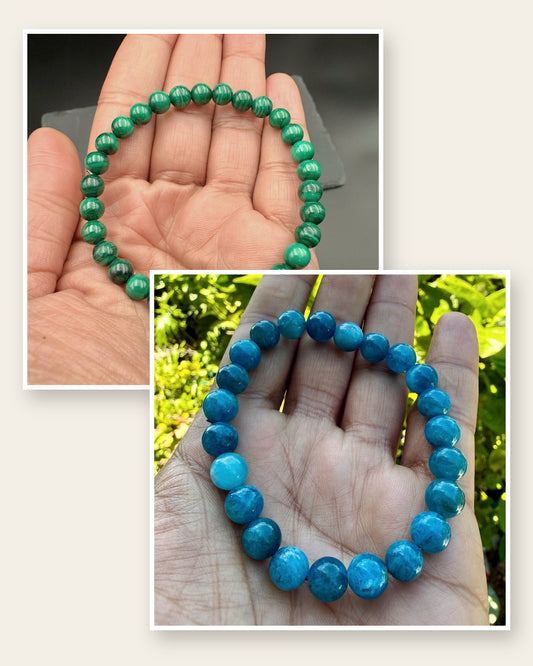 A malachite bracelet held in a palm and a blue apatite bracelet held in a palm, two real photos framed on cream