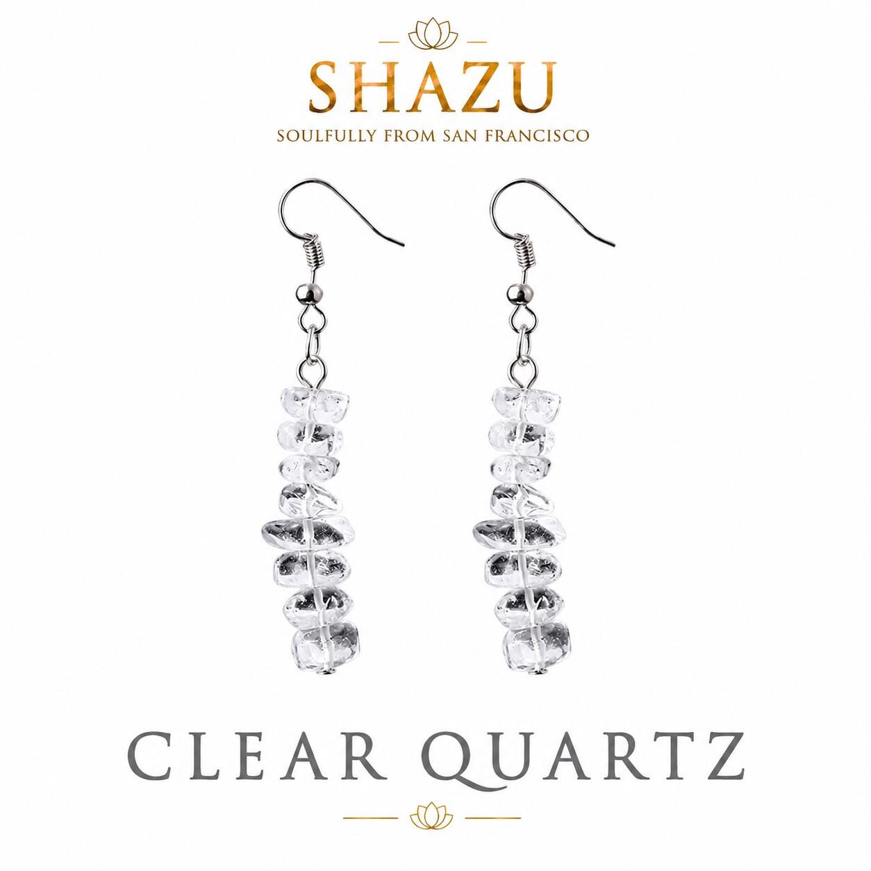 May include: A pair of drop earrings featuring silver-toned hooks and a vertical arrangement of clear, irregular-shaped quartz stones. The text SHAZU SOULFULLY FROM SAN FRANCISCO and CLEAR QUARTZ is visible at the top and bottom of the image.