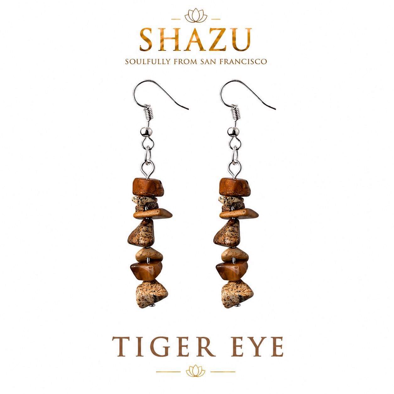 May include: A pair of drop earrings featuring silver-toned fishhook wires and small silver beads connected to a vertical stack of irregular, polished brown and tan tiger eye stone chips. The text SHAZU SOULFULLY FROM SAN FRANCISCO and TIGER EYE appears.