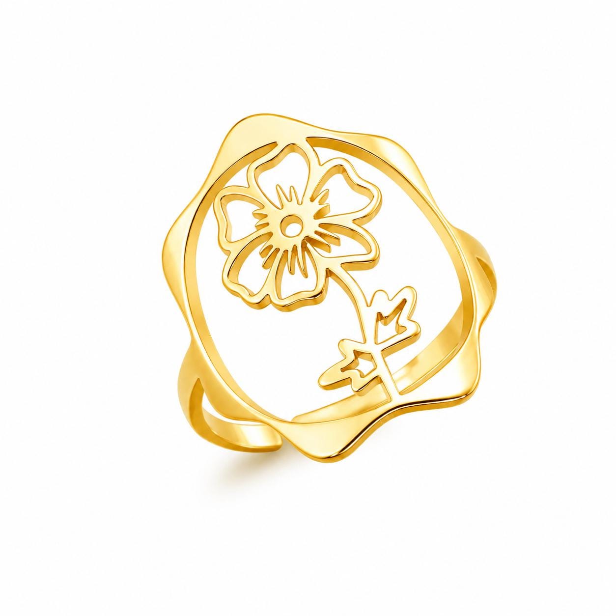 May include: A gold-toned ring featuring an openwork design with a central flower motif. The ring has a smooth, polished finish and a wavy, organic-shaped outer frame that surrounds the floral cutout, creating a continuous, singular piece.