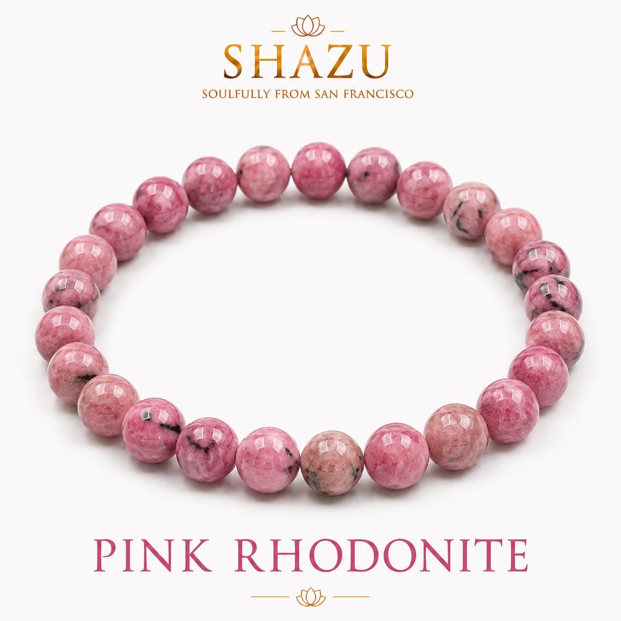 May include: A circular beaded bracelet made of polished pink rhodonite stones with black inclusions. The image includes the text SHAZU SOULFULLY FROM SAN FRANCISCO at the top and PINK RHODONITE at the bottom, centered on a plain white background.