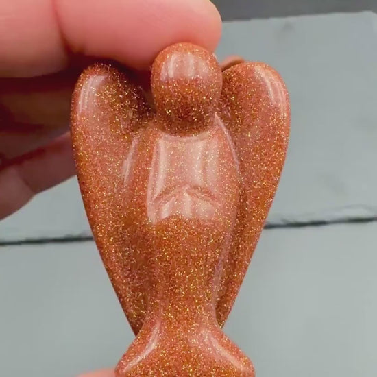 Red Goldstone Angel — Confidence & Motivation (man-made glass)